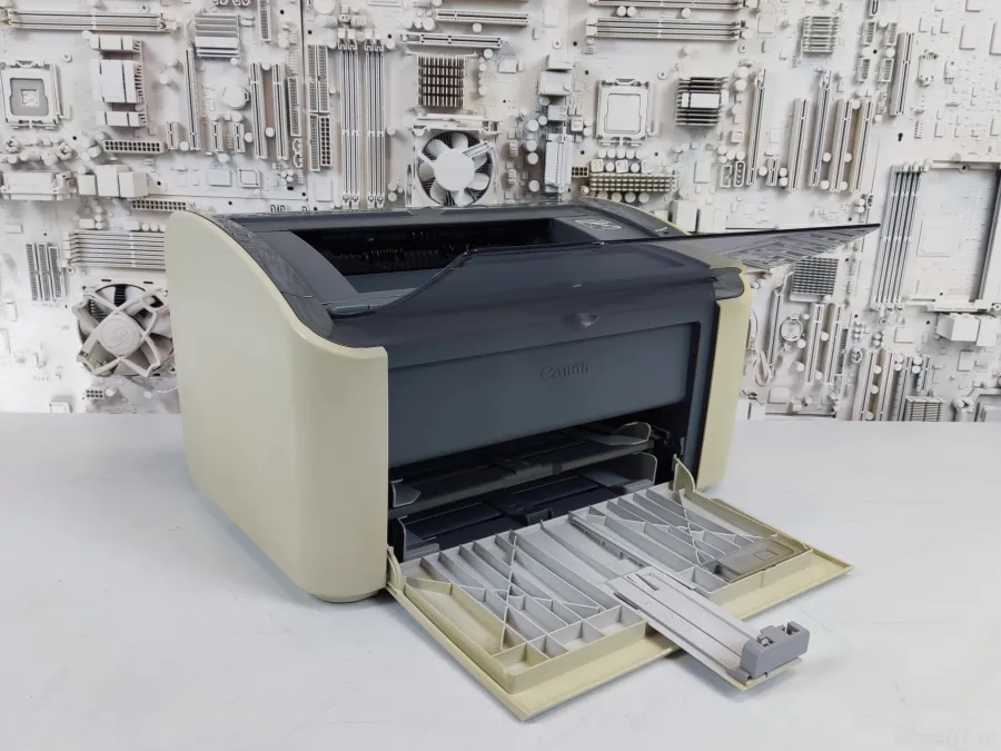  Canon LBP-2900,  703, 2000 .